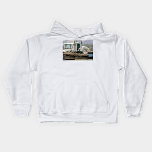 A white egret inspecting the nets Kids Hoodie